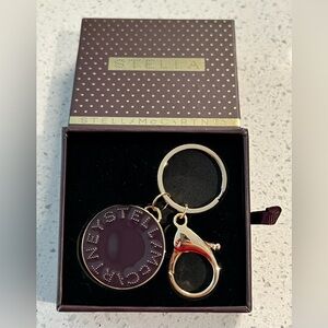 Stella McCartney Keychain -Purple/Gold Logo